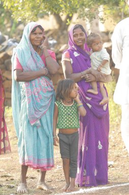Indian poor Mother and child watching Hyderabad India 2nd Aug 2022