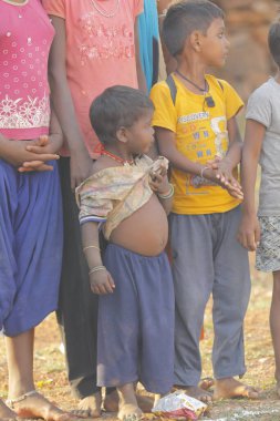Indian poor Mother and child watching Hyderabad India 2nd Aug 2022