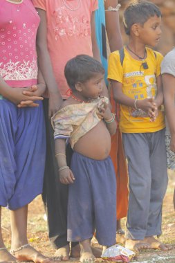 Indian poor Mother and child watching Hyderabad India 2nd Aug 2022