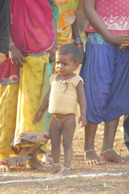 Indian poor Mother and child watching Hyderabad India 2nd Aug 2022