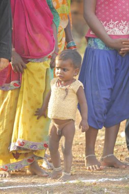 Indian poor Mother and child watching Hyderabad India 2nd Aug 2022