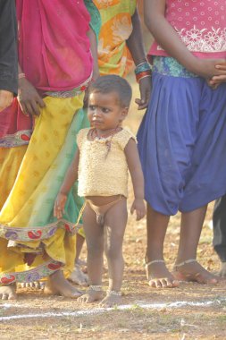 Indian poor Mother and child watching Hyderabad India 2nd Aug 2022