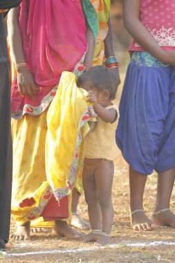 Indian poor Mother and child watching Hyderabad India 2nd Aug 2022