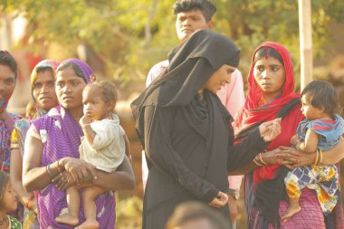 Indian poor Mother and child watching Hyderabad India 2nd Aug 2022