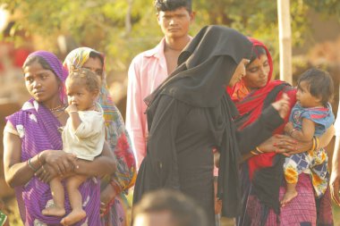 Indian poor Mother and child watching Hyderabad India 2nd Aug 2022