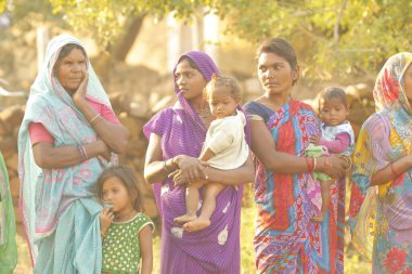 Indian poor Mother and child watching Hyderabad India 2nd Aug 2022