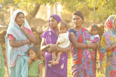Indian poor Mother and child watching Hyderabad India 2nd Aug 2022