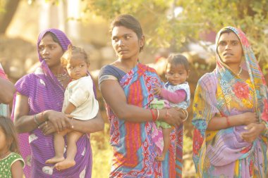 Indian poor Mother and child watching Hyderabad India 2nd Aug 2022