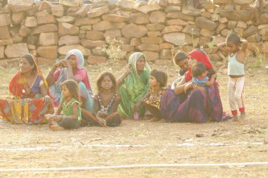 Indian poor Mother and child watching Hyderabad India 2nd Aug 2022