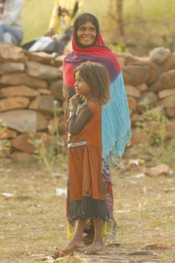 Indian poor Mother and child watching Hyderabad India 2nd Aug 2022