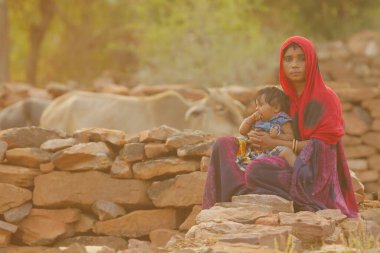 Indian poor Mother and child watching Hyderabad India 2nd Aug 2022
