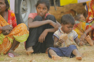 Indian poor Mother and child watching Hyderabad India 2nd Aug 2022