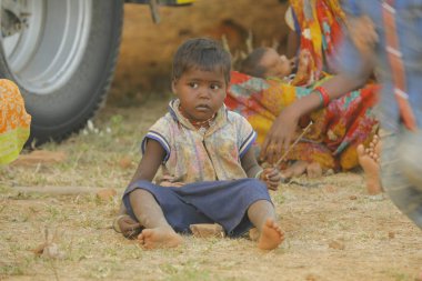 Indian poor Mother and child watching Hyderabad India 2nd Aug 2022
