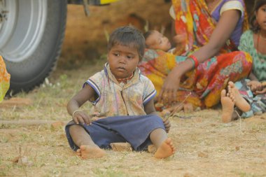Indian poor Mother and child watching Hyderabad India 2nd Aug 2022