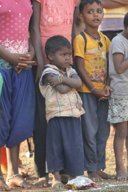 Indian poor Mother and child watching Hyderabad India 2nd Aug 2022