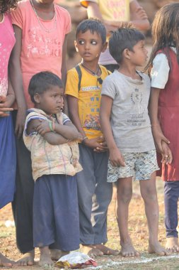 Indian poor Mother and child watching Hyderabad India 2nd Aug 2022