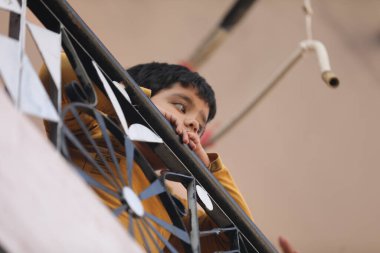 Young Indian Boy waching Hyderabad India 2nd Aug 2022
