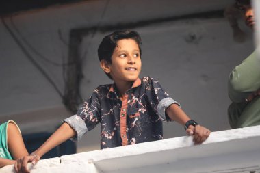 Young Indian Boy waching Hyderabad India 2nd Aug 2022