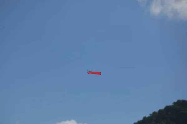 One Single Small Kite Flying — Stock Photo, Image