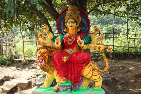 Hindu God Statue at tree