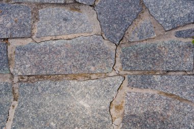 Granit taş bloklar, pürüzsüz bir zemin. Yüzey ve zemin için geometrik desen. Yüzleşen Taş