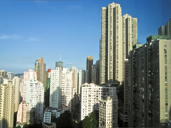 Skycrapers i hong kong med sol — Stockfoto