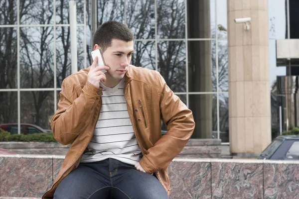 Young men with cellphone — Stock Photo, Image