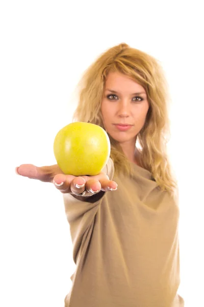Young woman holding green apple — Stock Photo, Image