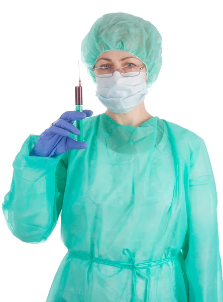 Doctor woman holds a medical syringe — Stock Photo, Image