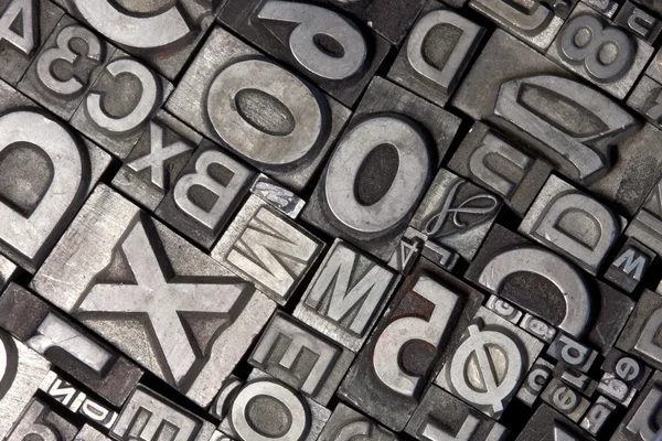 Arranjo aleatório de letras de chumbo tipografia — Fotografia de Stock