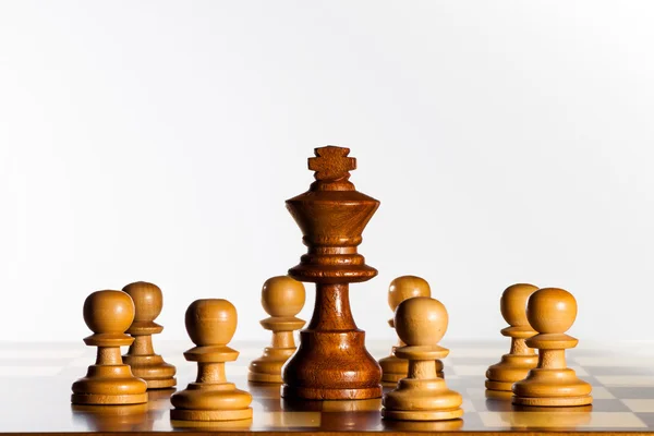 King and pawns — Stock Photo, Image