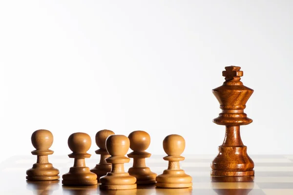 King and pawns — Stock Photo, Image