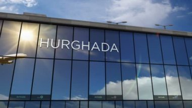 Jet uçakları Hurghada, Mısır 'a iniyor. 3 boyutlu animasyon. Cam havaalanı terminali ve uçağın yansıması ile şehre varış. Seyahat, iş, turizm ve ulaşım kavramı.
