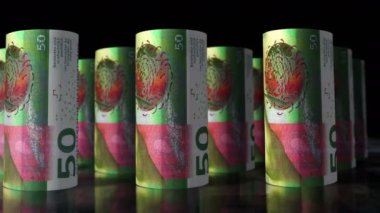 İsviçre Frangı para ruloları 3D döngü animasyonu. Kamera 50 CHF 'nin önünde hareket ediyor. İsviçre 'de kusursuz bir ekonomi, finans, iş ve borç kavramı.