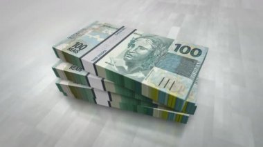 Brezilya gerçek para yığını. Brezilya 'da ekonomi, bankacılık, iş, kriz, durgunluk, borç ve finans kavramları. 100 BRL banknotları canlandırmayı desteler.