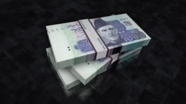 Pakistan Rupisi para yığını. Ekonomi, bankacılık, iş, kriz, durgunluk, borç ve finans konularının kavramı. 1000 PKR banknotları canlandırmayı desteler.