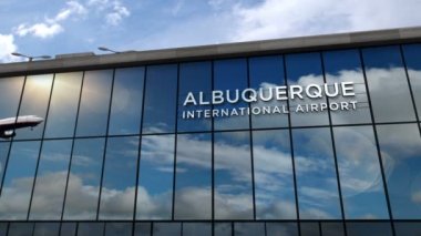 Albuquerque, ABD, New Mexico 'ya inen uçak animasyon yapıyor. Cam havaalanı terminali ve jet uçağının yansımasıyla şehre vardık. Seyahat, turizm ve ulaşım kavramı.