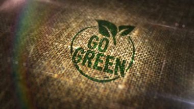 Doğal keten çuvalına yeşil ve çevre dostu sembol damgası vur. CO2 nötr, ekoloji, çevre ve iklim, organik kahve veya kakao üretimi 3 boyutlu tasarım soyut kavram. Döngülü ve pürüzsüz.