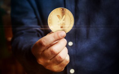 Japon Yen altın sikkesi elde soyut kavram.