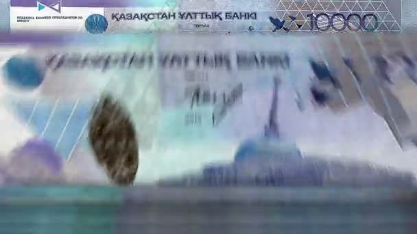 カザフスタン銀行券でテンのお金の計算機 クイックKzt通貨は回転を下にメモします カザフスタンのビジネスと経済 コンセプトループ可能でシームレスな背景 — ストック動画