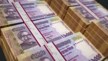Bangladeşli Taka para paketi 3D animasyon. Bangladeş 'te kusursuz finans, nakit, ekonomi, iş ve banka kavramı. 1000 BDT banknot destesi üzerinde hareket eden kamera.