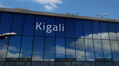 Plane landing at Kigali, Rwanda 3D. Arrival in the city with the glass airport terminal and reflection of the jet aircraft. Travel, business, tourism and transport concept.