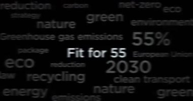 Headline news across international media with Fit for 55 green deal reduce the greenhouse gas emissions. Abstract concept of news titles on noise displays loop. TV glitch effect seamless and looped.