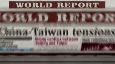 China and Taiwan tensions, conflict and crisis daily newspaper report printing. Abstract concept retro 3d rendering seamless looped.