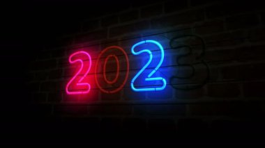 2023 year neon on brick wall. Light color bulbs. Abstract concept 3d animation.