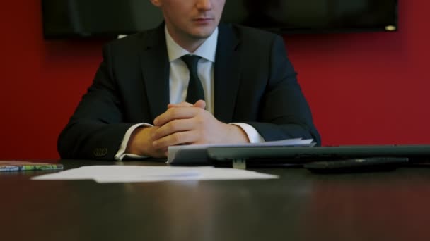 Businessman in formal wear carefully reading contract terms of conditions, putting signature on paper. Close up view — 图库视频影像