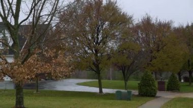 Suburban Home and street in autumn time 