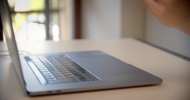 Close up shot of young woman hold credit card use notebook computer typing number payments at home or office. — Vídeo de Stock