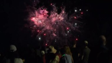People watching Fireworks Fireworks night on holiday. 4th July. High quality 4k footage