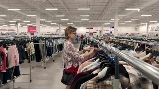 Close Female Hands Plucked Hanger Choosing Clothes Store High Quality — Video Stock